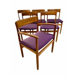 Set of 6 danish teak wood dining chairs with purple seats.