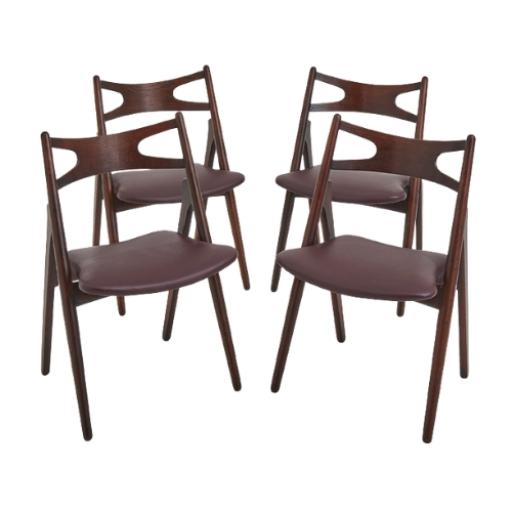 A Set Of Four Hans Wegner 'Sawbuck' CH 29 Dining Chairs