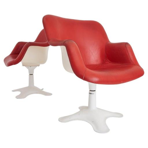 A Pair Of Red Leather vintage 'Junior' Chairs By Yrjo Kukkapuro